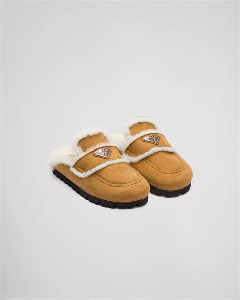 prada furry slippers|Prada shearling slippers.